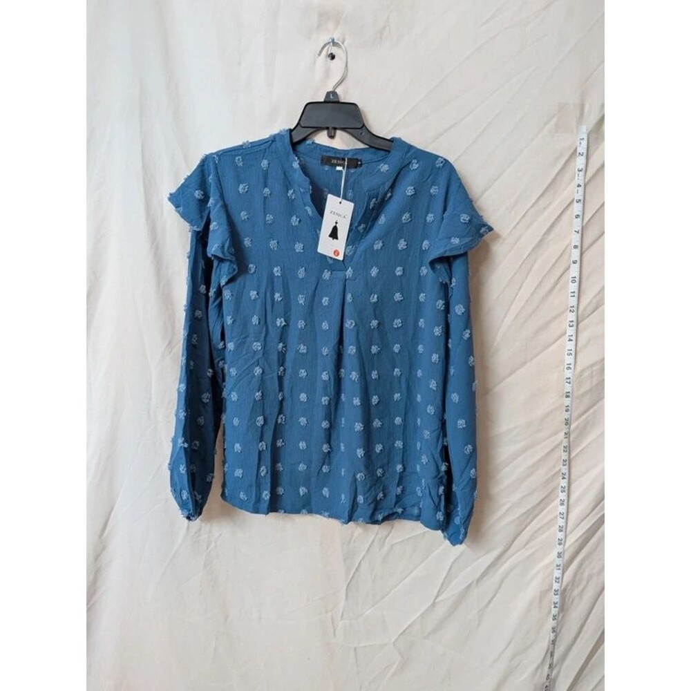 ZESICA long-sleeve V-neck blouse with textured swiss dot detail ruffle shoulders